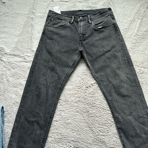 Worn once 31-32 all black Levi Jeans